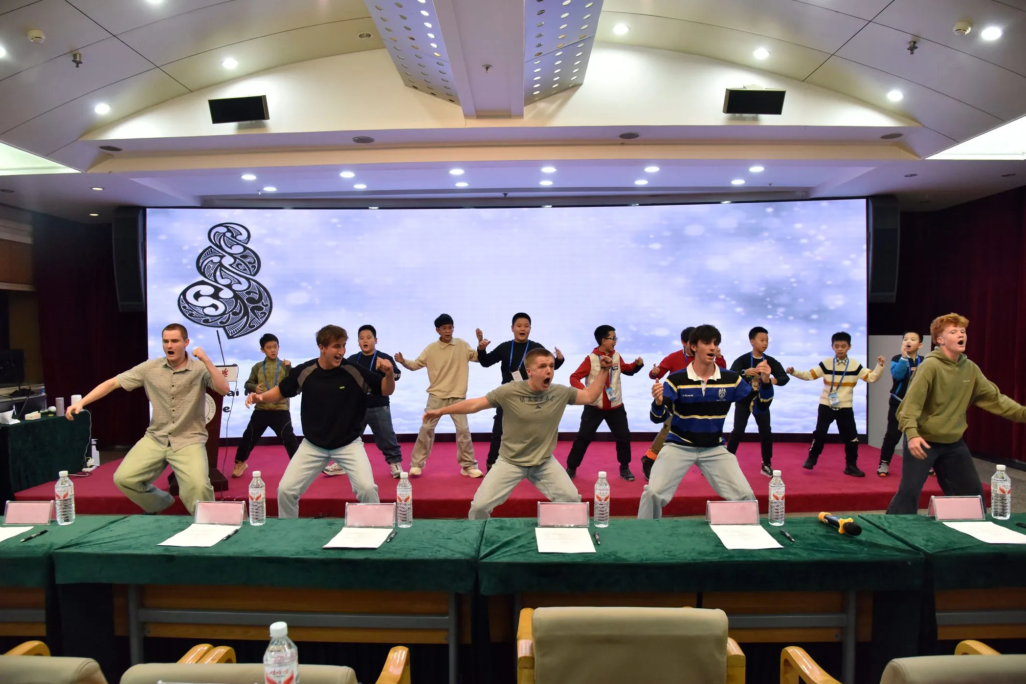Students performing together on stage